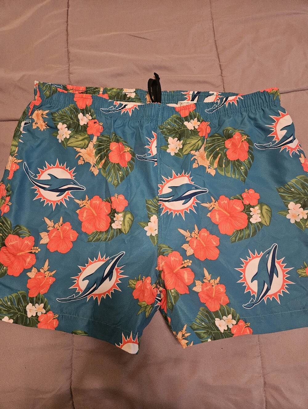 NFL Men’s Dolphins Teal Swim Trunks with Coral Floral Print